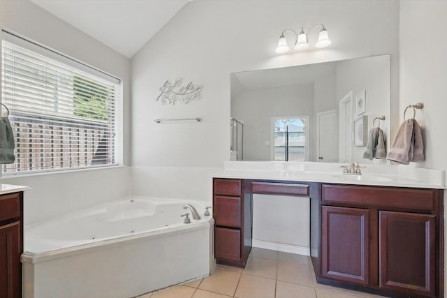 12303 Blue Ridge Dr, Frisco, TX 75033 - full bathroom featuring vanity, vaulted ceiling, a tub with jets, tile patterned flooring, and a stall shower