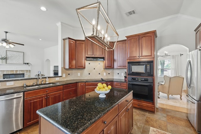 12303 Blue Ridge Dr, Frisco, TX 75033 - kitchen with black appliances, a sink, a ceiling fan, hanging light fixtures, and decorative backsplash