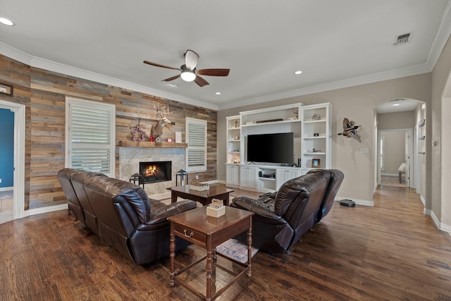 436 Valley View Ct, Aledo, TX 76008 - living room featuring arched walkways, a ceiling fan, wood finished floors, baseboards, and ornamental molding