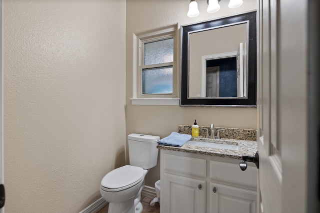 436 Valley View Ct, Aledo, TX 76008 - half bathroom with baseboards, a textured wall, toilet, and vanity