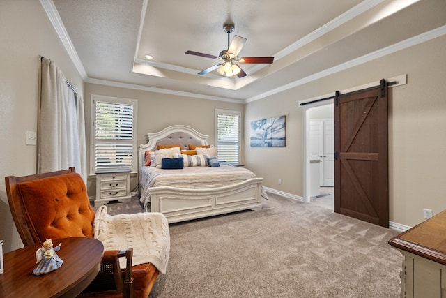 436 Valley View Ct, Aledo, TX 76008 - bedroom featuring a tray ceiling, multiple windows, a barn door, carpet flooring, and crown molding