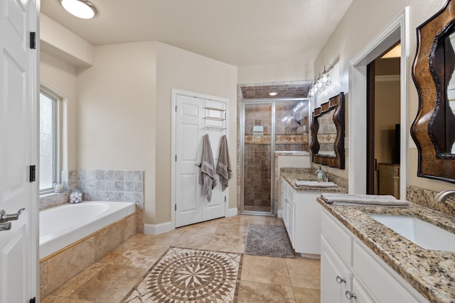 436 Valley View Ct, Aledo, TX 76008 - bathroom featuring a stall shower, two vanities, a garden tub, and tile patterned flooring