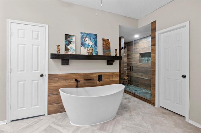 2804 Laurel Hill Dr, Flower Mound, TX 75028 - bathroom with a freestanding bath and a stall shower