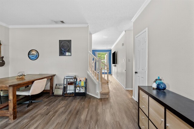 2804 Laurel Hill Dr, Flower Mound, TX 75028 - home office featuring dark wood-style flooring, ornamental molding, baseboards, and a textured ceiling
