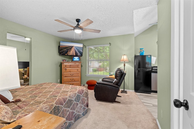 2804 Laurel Hill Dr, Flower Mound, TX 75028 - bedroom featuring freestanding refrigerator, a textured ceiling, ceiling fan, and baseboards
