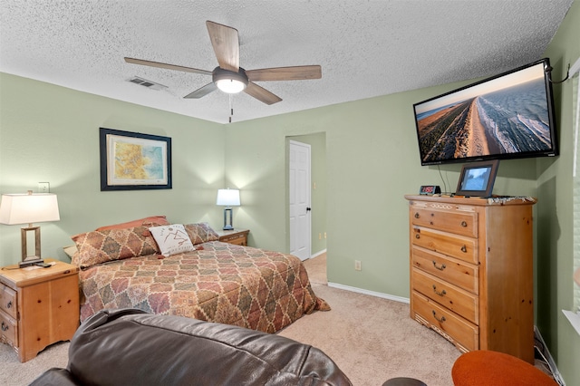 2804 Laurel Hill Dr, Flower Mound, TX 75028 - bedroom with light colored carpet, a textured ceiling, ceiling fan, and baseboards