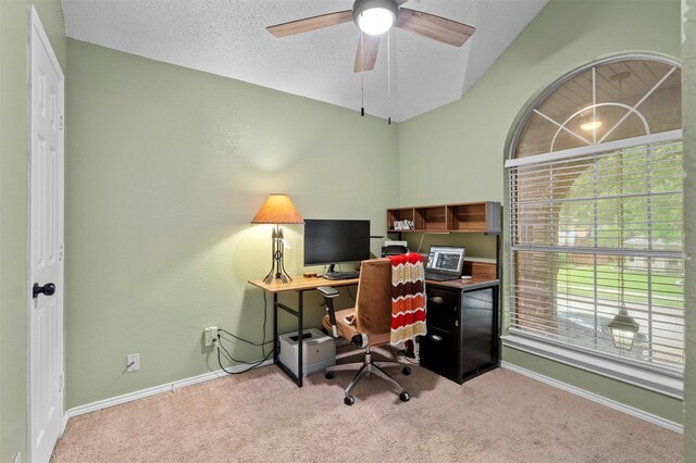 2804 Laurel Hill Dr, Flower Mound, TX 75028 - office area featuring vaulted ceiling, carpet floors, a ceiling fan, baseboards, and a textured ceiling