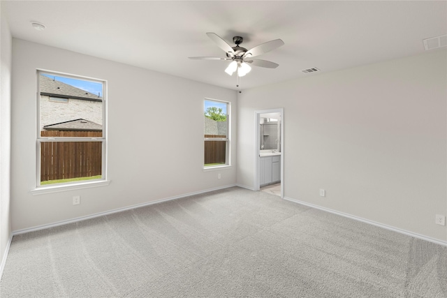 3105 Sedge Grass Dr, Melissa, TX 75454 - empty room featuring a ceiling fan, a smoke detector, and light colored carpet