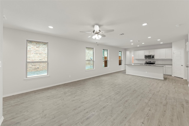 3105 Sedge Grass Dr, Melissa, TX 75454 - unfurnished living room with recessed lighting, a ceiling fan, and light wood-style floors