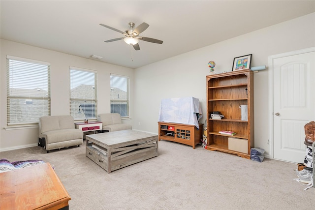 1909 Outpost Creek Ln, Aubrey, TX 76227 - carpeted living area with a ceiling fan and baseboards