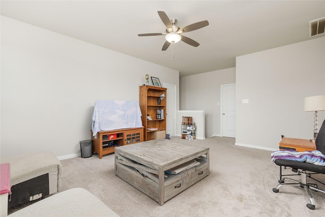 1909 Outpost Creek Ln, Aubrey, TX 76227 - living room featuring light colored carpet, baseboards, and ceiling fan