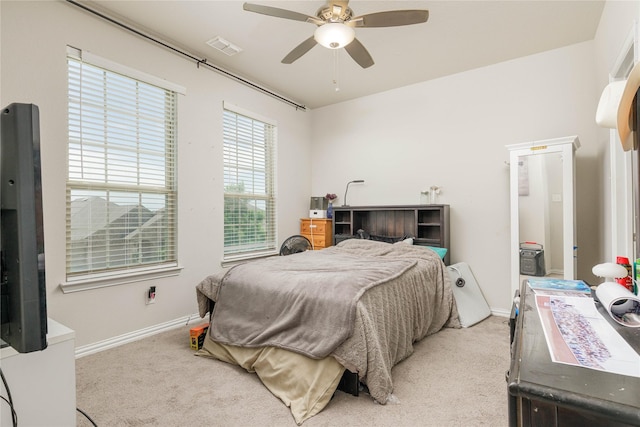 1909 Outpost Creek Ln, Aubrey, TX 76227 - bedroom with light colored carpet, baseboards, and ceiling fan