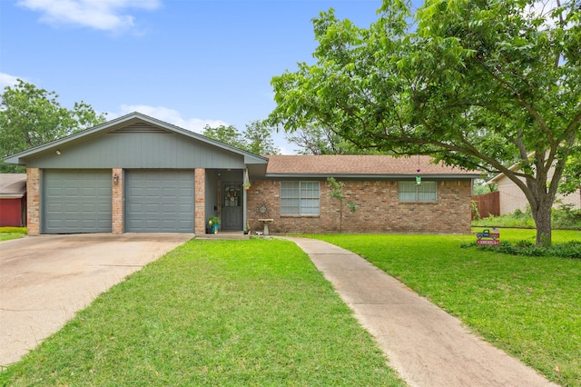 208 Alamosa Dr, Hewitt, TX 76643 - single story home featuring brick siding, a garage, concrete driveway, and a front lawn