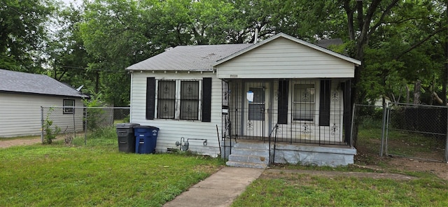 1645 Marfa Ave, Dallas, TX 75216 - bungalow featuring a porch and a shingled roof
