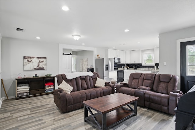 420 Fm 1528, Cooper, TX 75432 - living room featuring light wood-type flooring and recessed lighting