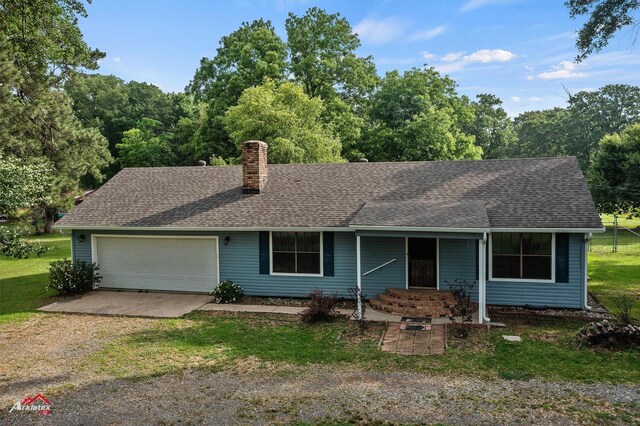 5630 Shreveport Blanchard Hwy, Shreveport, LA 71107 - single story home featuring an attached garage, a chimney, driveway, and a front lawn