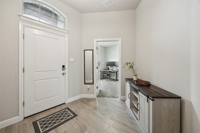236 Mossy Cliff Ln, Fort Worth, TX 76052 - entryway with wood tiled floors and baseboards