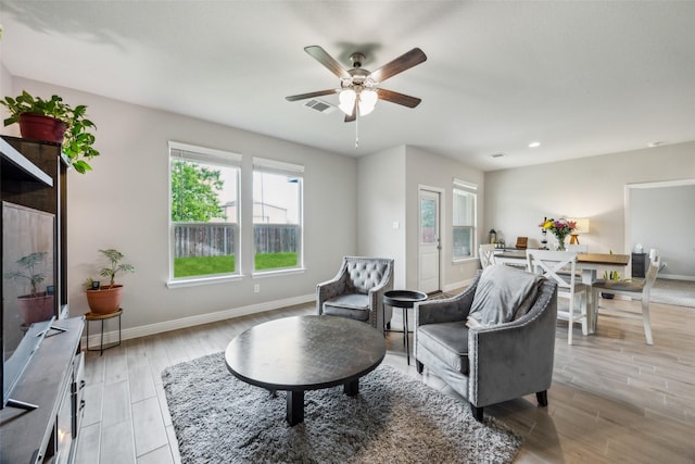 236 Mossy Cliff Ln, Fort Worth, TX 76052 - living area with healthy amount of natural light, baseboards, light wood finished floors, a ceiling fan, and recessed lighting