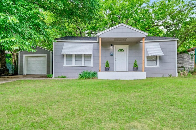 630 16th St NE, Paris, TX 75460 - view of front of house with a front lawn, concrete driveway, roof with shingles, and a garage