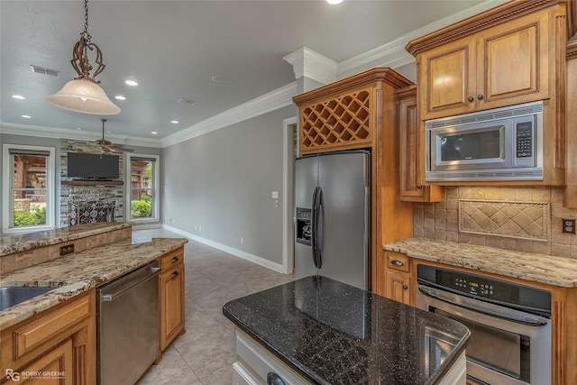 2549 Bloomfield Ln, Haughton, LA 71037 - kitchen with freestanding refrigerator, ornamental molding, baseboards, recessed lighting, and backsplash