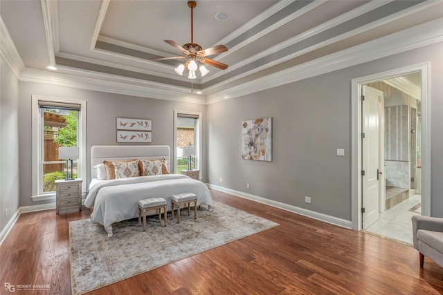 2549 Bloomfield Ln, Haughton, LA 71037 - empty room with healthy amount of natural light, a raised ceiling, wood finished floors, and ornamental molding