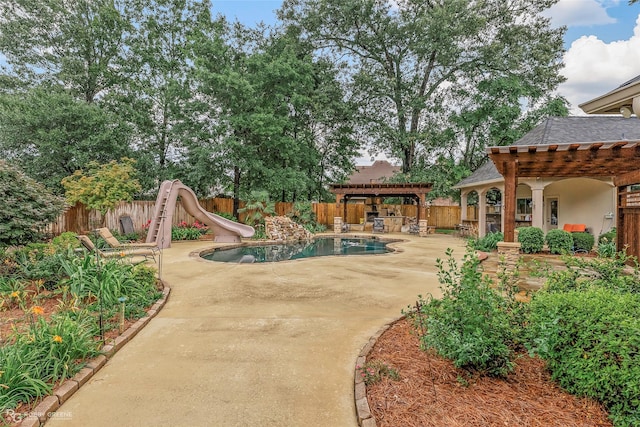 2549 Bloomfield Ln, Haughton, LA 71037 - view of swimming pool featuring a water slide, a pergola, a fenced backyard, and a patio area