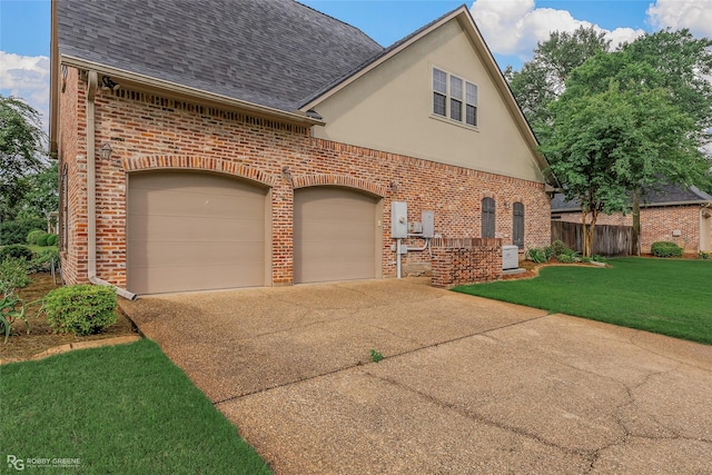 2549 Bloomfield Ln, Haughton, LA 71037 - view of front of house featuring brick siding, a shingled roof, concrete driveway, and stucco siding