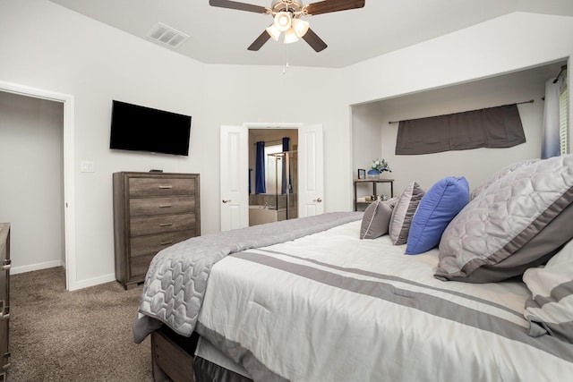 carpeted bedroom featuring baseboards, a ceiling fan, and connected bathroom