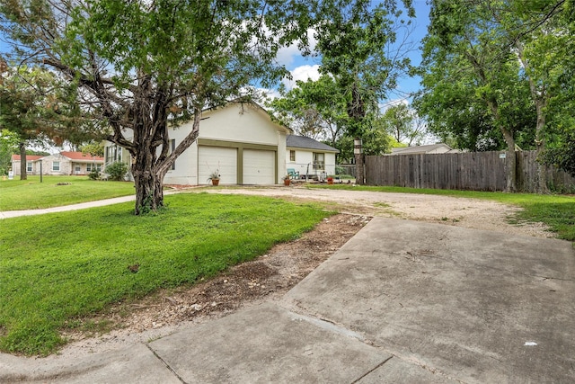 3801 Fort Ave, Waco, TX 76710 - view of front facade with dirt driveway, an attached garage, and stucco siding