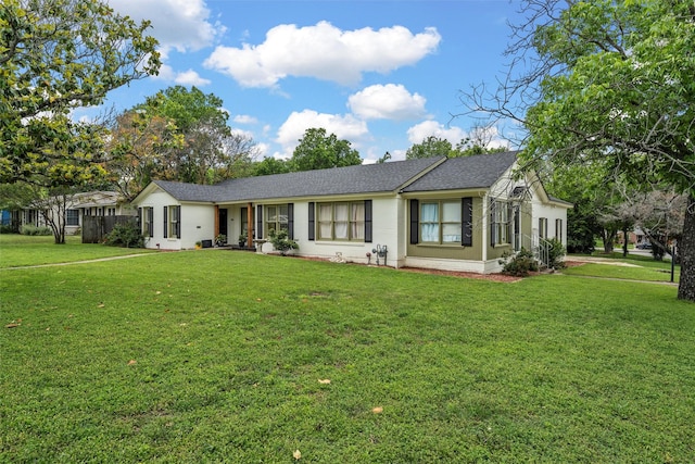 3801 Fort Ave, Waco, TX 76710 - ranch-style house featuring a front lawn and a shingled roof