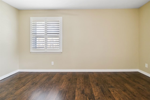 5818 Meadowick Ln, Dallas, TX 75227 - spare room featuring wood finished floors and baseboards