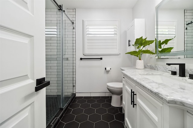 5818 Meadowick Ln, Dallas, TX 75227 - full bath featuring a shower stall, toilet, vanity, and tile patterned flooring