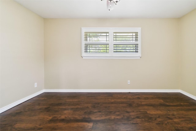 5818 Meadowick Ln, Dallas, TX 75227 - empty room with wood finished floors, baseboards, and ceiling fan