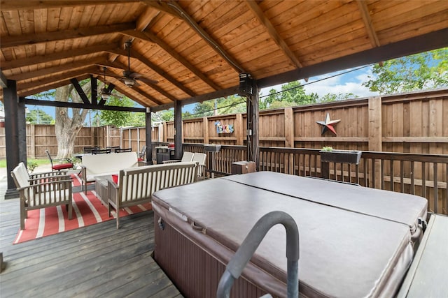 5818 Meadowick Ln, Dallas, TX 75227 - deck featuring ceiling fan, a fenced backyard, outdoor lounge area, a gazebo, and a hot tub