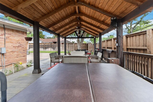5818 Meadowick Ln, Dallas, TX 75227 - fenced backyard with ceiling fan, a gazebo, outdoor lounge area, and a patio area