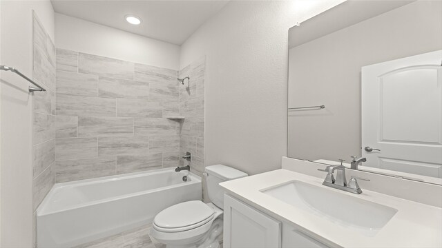 7522 Prairie Holly Ln, Midlothian, TX 76084 - bathroom with toilet, vanity,  shower combination, and recessed lighting