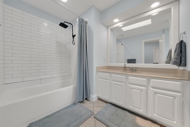 2434 Antler Trl, Lewisville, TX 75067 - full bathroom with tile patterned flooring, shower / tub combo, vanity, recessed lighting, and a skylight