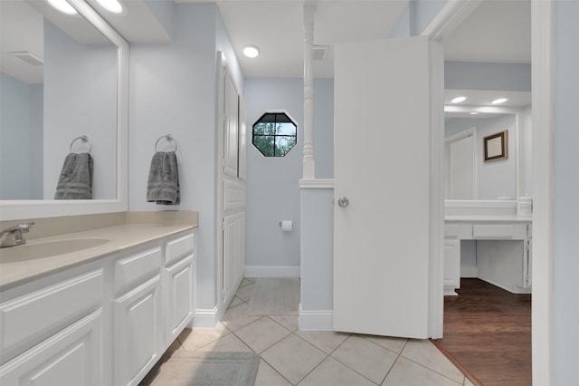 2434 Antler Trl, Lewisville, TX 75067 - bathroom featuring tile patterned floors, vanity, recessed lighting, and baseboards