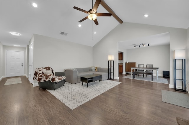 2434 Antler Trl, Lewisville, TX 75067 - living room featuring ceiling fan, dark wood-style floors, baseboards, beamed ceiling, and high vaulted ceiling