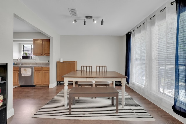 2434 Antler Trl, Lewisville, TX 75067 - dining room with dark wood finished floors and track lighting