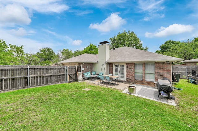 2434 Antler Trl, Lewisville, TX 75067 - back of house featuring brick siding, a patio area, a chimney, outdoor lounge area, and roof with shingles
