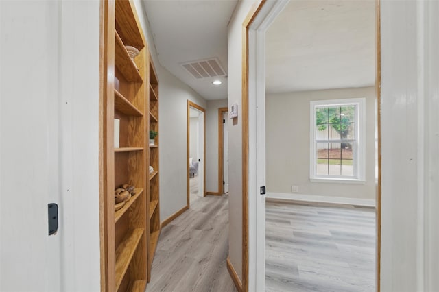 304 E Lee Ave, Weatherford, TX 76086 - hall featuring light wood-style floors and baseboards
