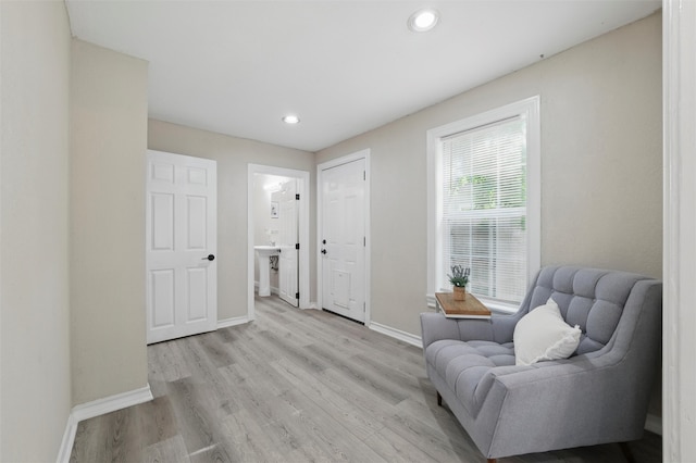 304 E Lee Ave, Weatherford, TX 76086 - living area with baseboards, light wood finished floors, and recessed lighting