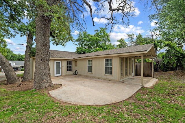 304 E Lee Ave, Weatherford, TX 76086 - back of property with a patio area and a shingled roof