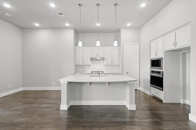 2805 Upland Trail Ln, Aubrey, TX 76227 - kitchen with oven, built in microwave, light countertops, backsplash, and white cabinets