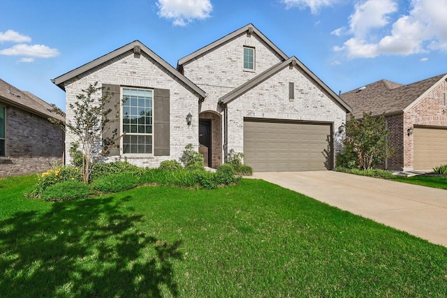 2805 Upland Trail Ln, Aubrey, TX 76227 - french provincial home with driveway, a front lawn, brick siding, and an attached garage