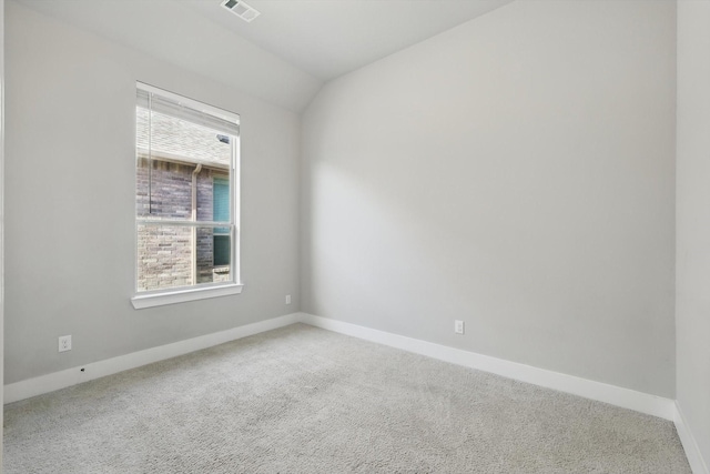 2805 Upland Trail Ln, Aubrey, TX 76227 - spare room featuring carpet floors, baseboards, and lofted ceiling