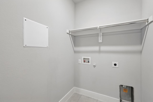2805 Upland Trail Ln, Aubrey, TX 76227 - washroom with electric dryer hookup, hookup for a washing machine, baseboards, gas dryer hookup, and light tile patterned floors