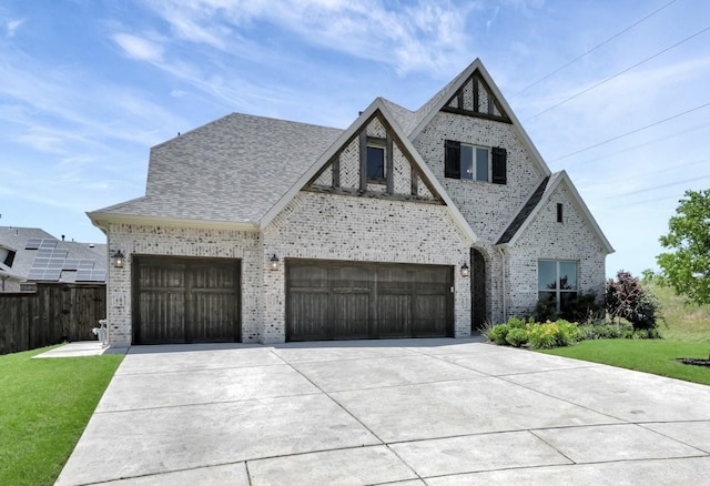 1208 Thornhill Ct, Roanoke, TX 76262 - view of front facade featuring brick siding, concrete driveway, an attached garage, and roof with shingles