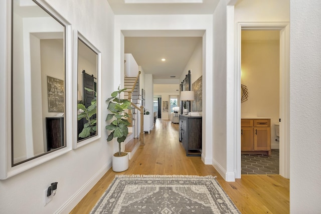 1208 Thornhill Ct, Roanoke, TX 76262 - corridor with light wood-style floors, baseboards, stairway, and recessed lighting